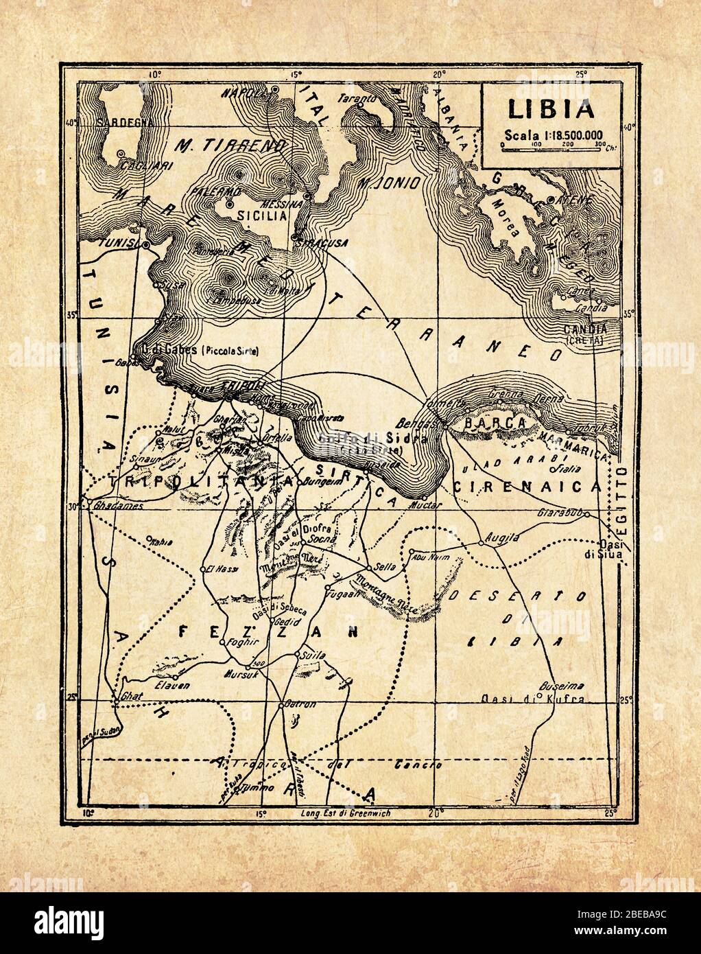 Antica mappa del paese della Libia nella regione del Maghreb in Nord Africa sul Mar Mediterraneo formato da Tripolitania, Fezzan e Cirenaica con nomi e descrizioni geografiche italiane Foto Stock