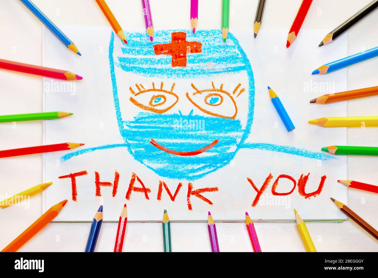 Grazie coronavirus aiutanti. Gli operatori chiave sono gli operatori ospedalieri. Simbolo di speranza durante l'epidemia di coronavirus COVID-19. Gli operatori sanitari sono fondamentali Foto Stock