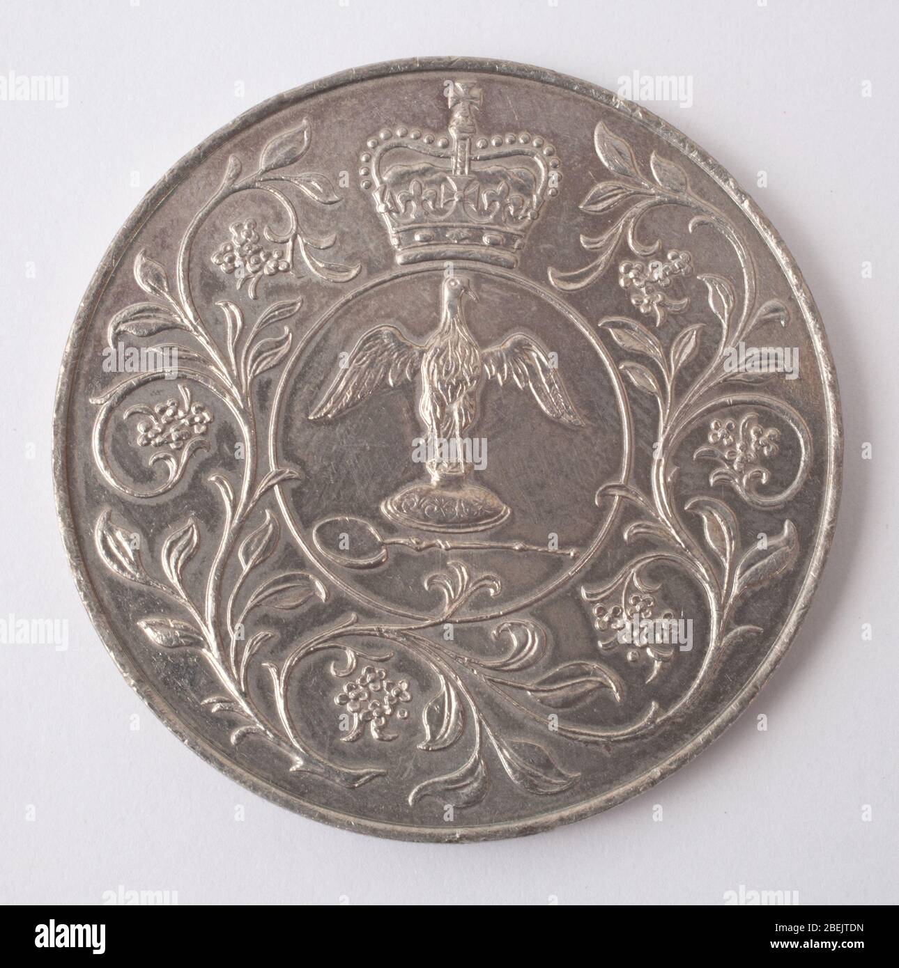 Una moneta commemorativa del Giubileo d'argento britannico del venticinque pence del 1977 Foto Stock