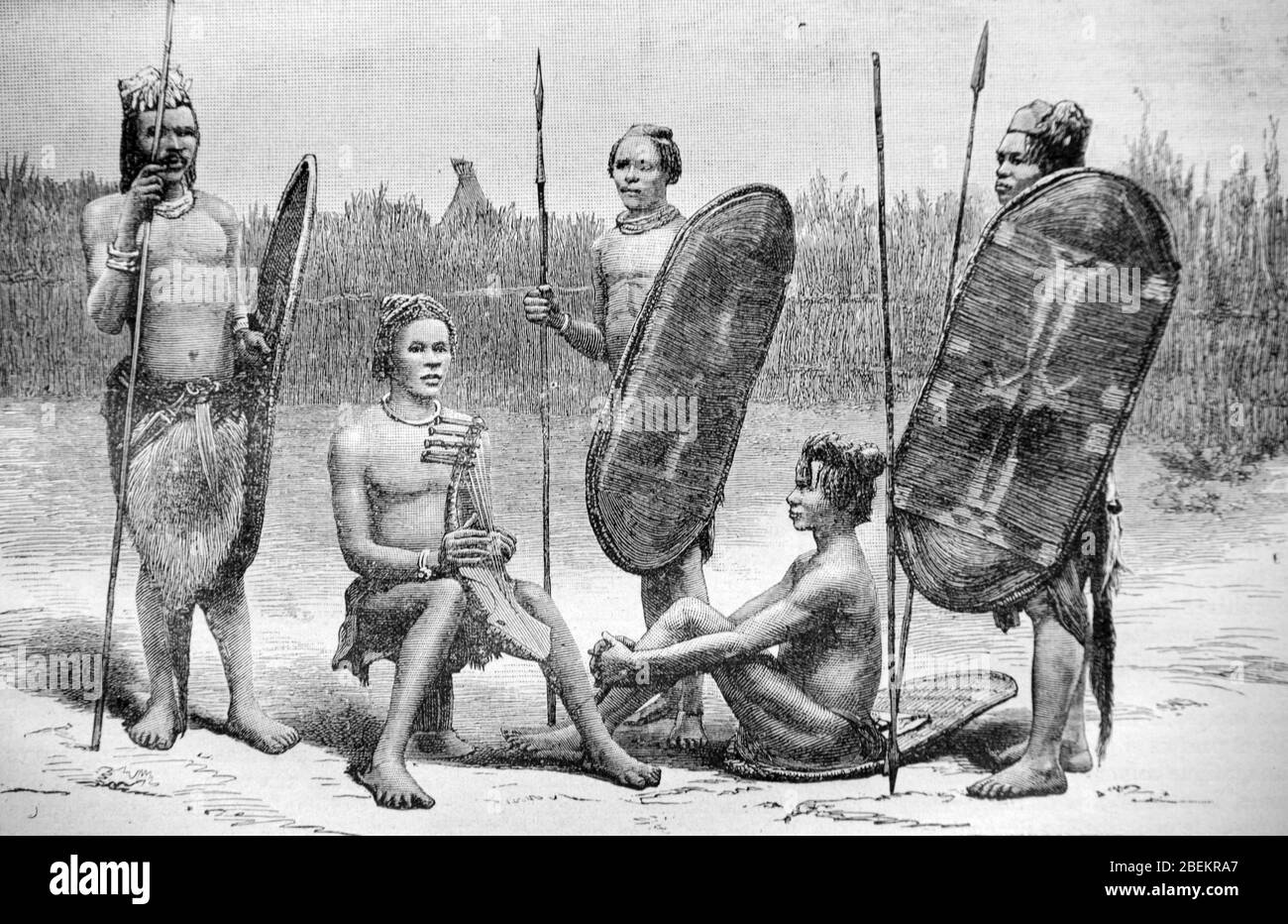 Niam-niam o nyam-nyam Guerrieri con Shields e Spears, ora il popolo Zande o Azande, un gruppo etnico del Nord Africa Centrale che comprende parti del Congo, del Sud Sudan e della Repubblica Centrafricana. Vintage o Old Illustration o Engraving 1887. Foto Stock