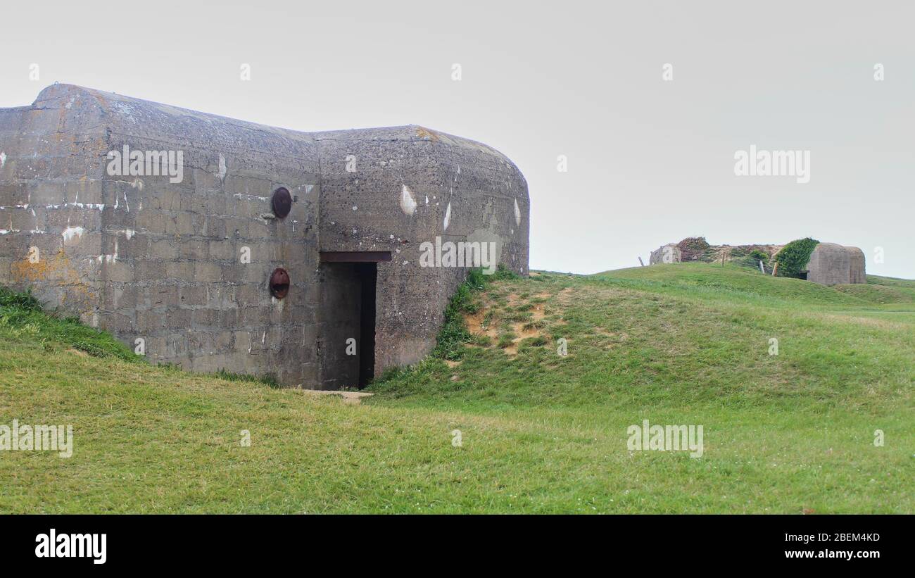 Resti della batteria tedesca che è stato catturato il 07 1944 giugno, Bunker e armi da fuoco Foto Stock