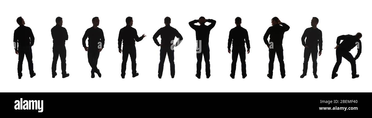 La foto di silhouette di un uomo in piedi pone isolato su sfondo bianco Foto Stock