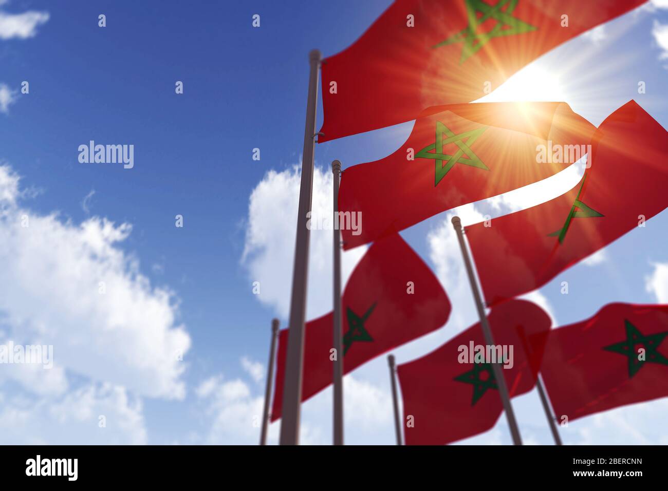 Le bandiere del Marocco sventolano contro un cielo blu. Rendering 3D Foto Stock