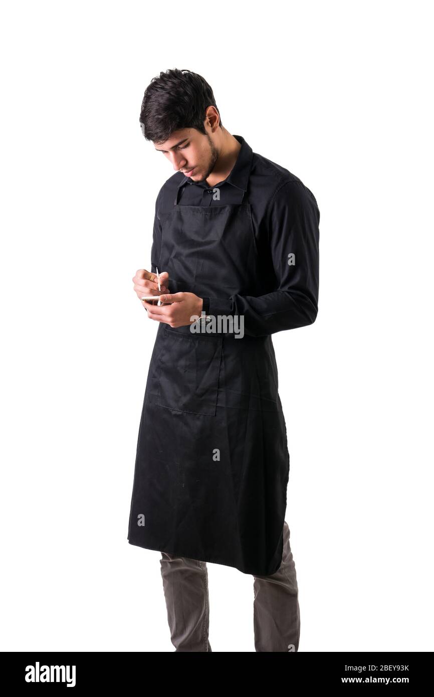 Il giovane chef cameriere o indossare nero grembiule isolato Foto Stock