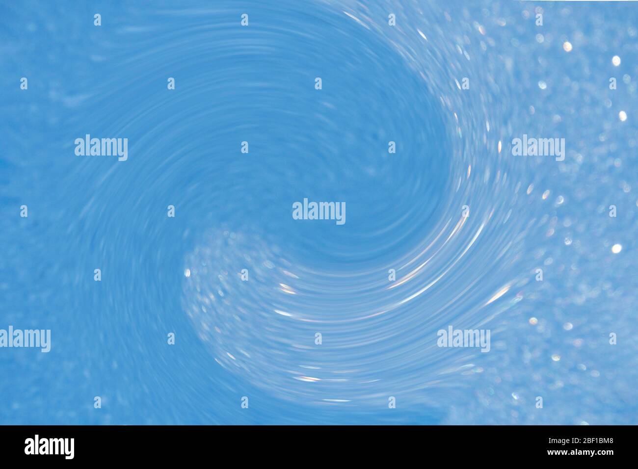onda yin yang sfocata in toni blu, flusso vortex energia, simbolo astratto di equilibrio, effetto onda, arte Foto Stock