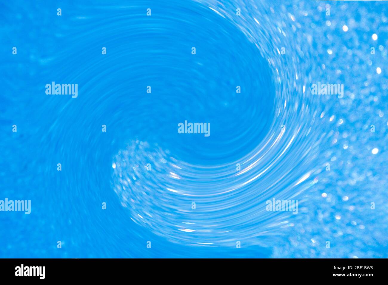 onda yin yang sfocata in toni blu, flusso vortex energia, simbolo astratto di equilibrio, effetto onda, arte Foto Stock