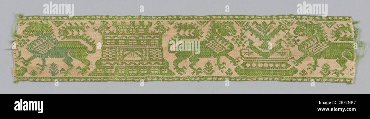 Banda. Fascia intrecciata in verde e crema. Disegno di leoni confrontati, una fontana e un castello. Foto Stock