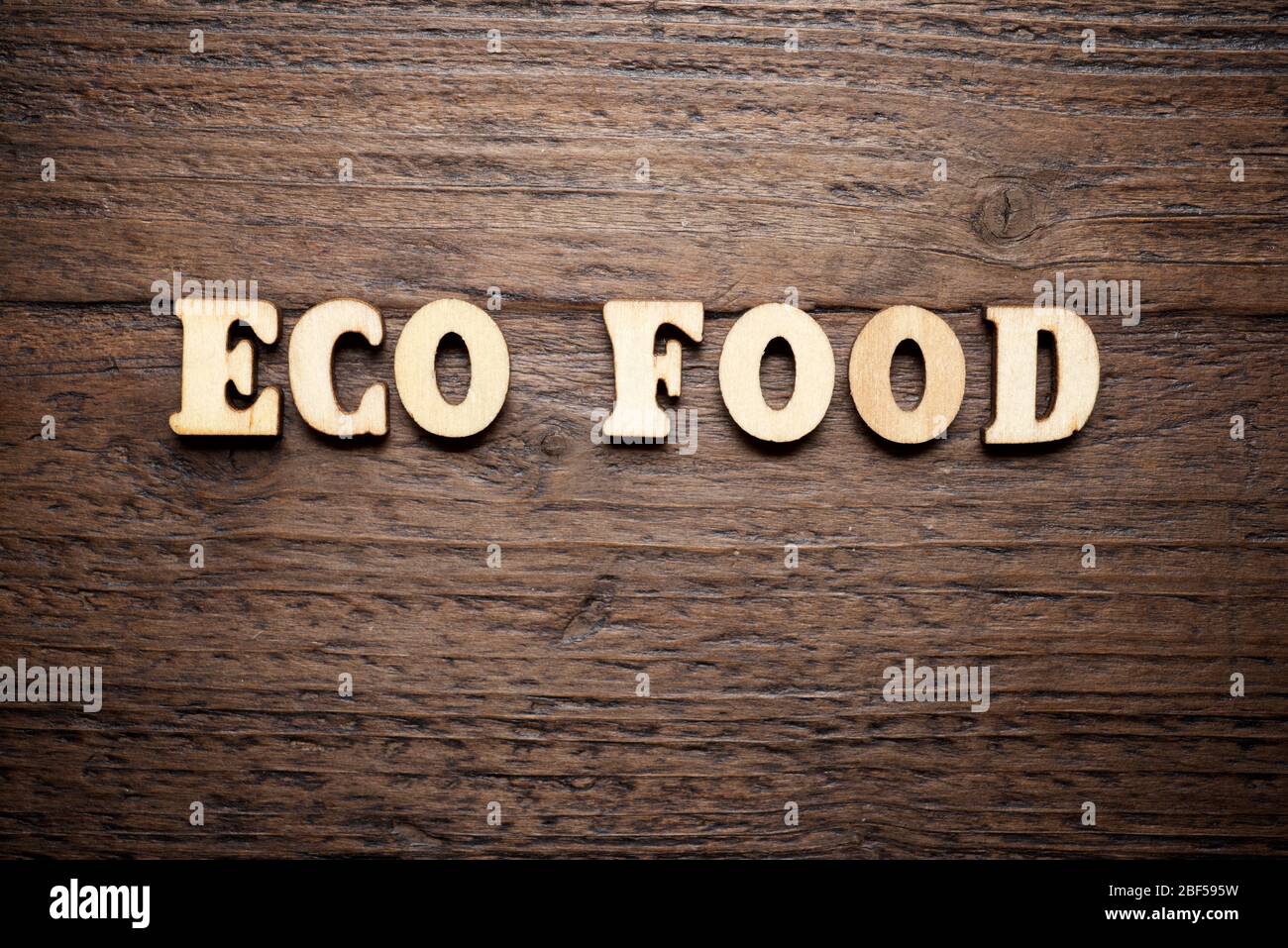 Testo eco food su un tavolo di legno. Foto Stock