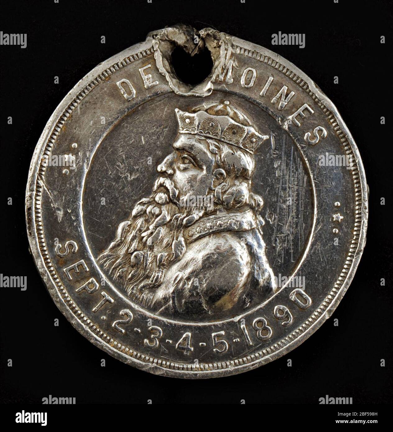 Des Moines Iowa Owney tag. Il retro di questa medaglia ha un'immagine di un edificio identificato come la capitale dello Stato dello Iowa e sembra indicare il prezzo dell'edificio, 3,000,000.00 dollari. Foto Stock