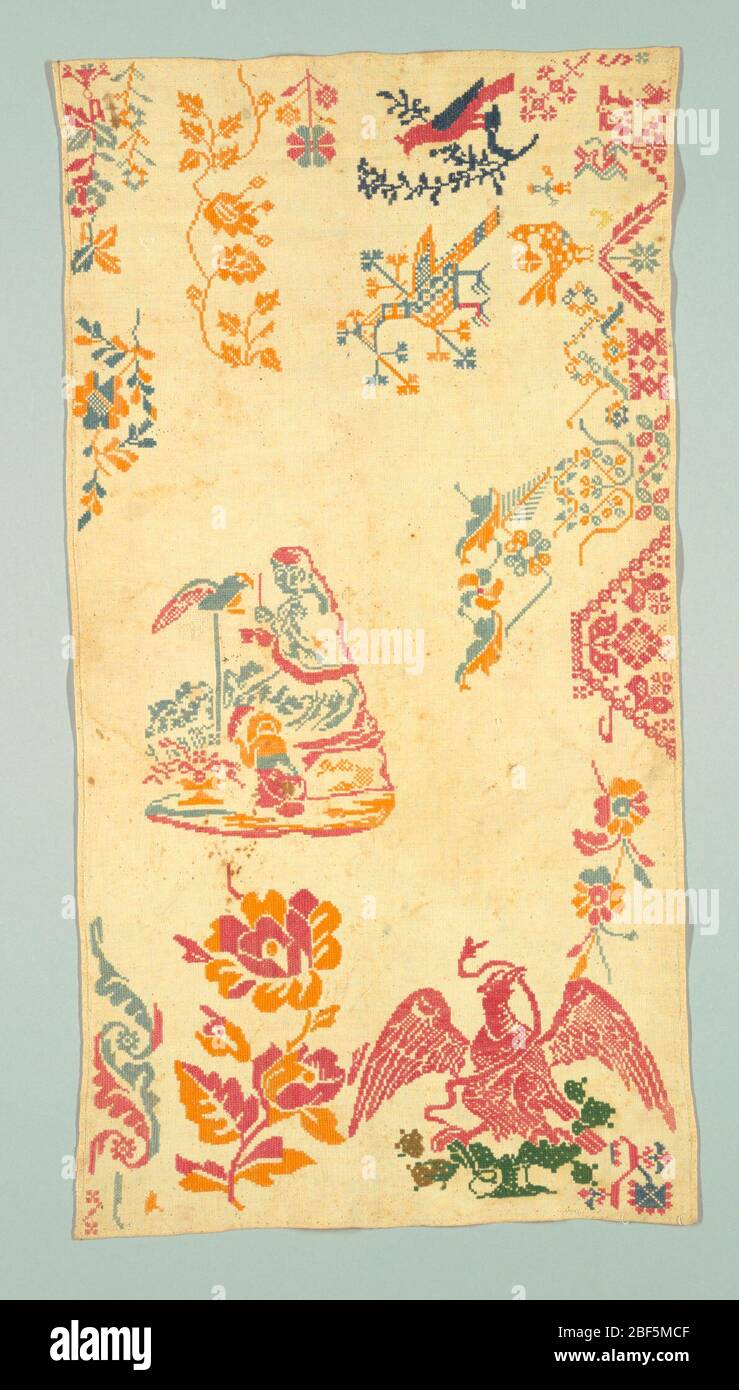 Campionatore. Motivi isolati tra cui aquila messicana con serpente e donna con bambino e pappagallo, in nero, blu, giallo e rosa su bianco. Foto Stock