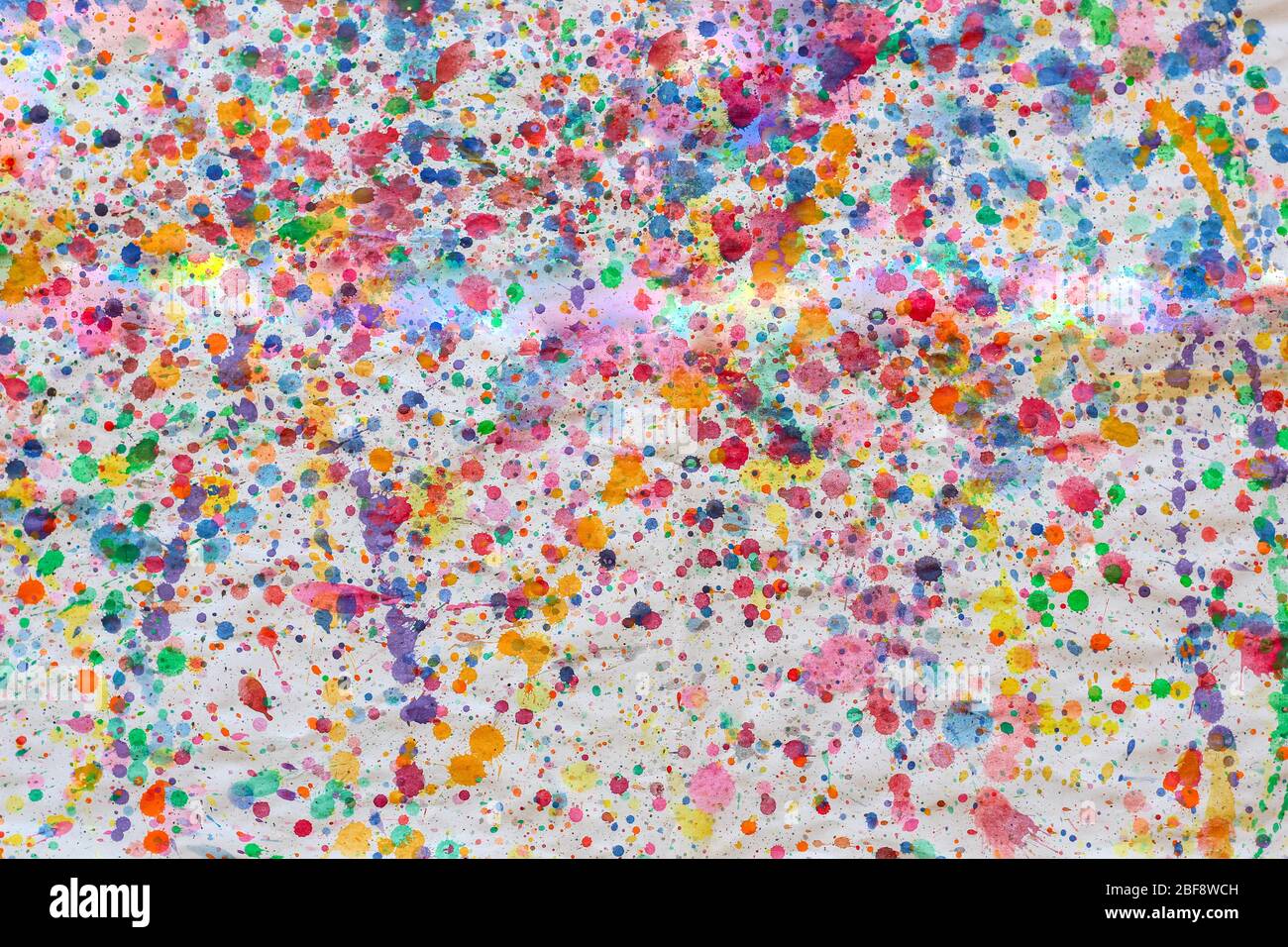 Spruzzi colorati di pennello acquerello. Sfondo astratto Foto Stock