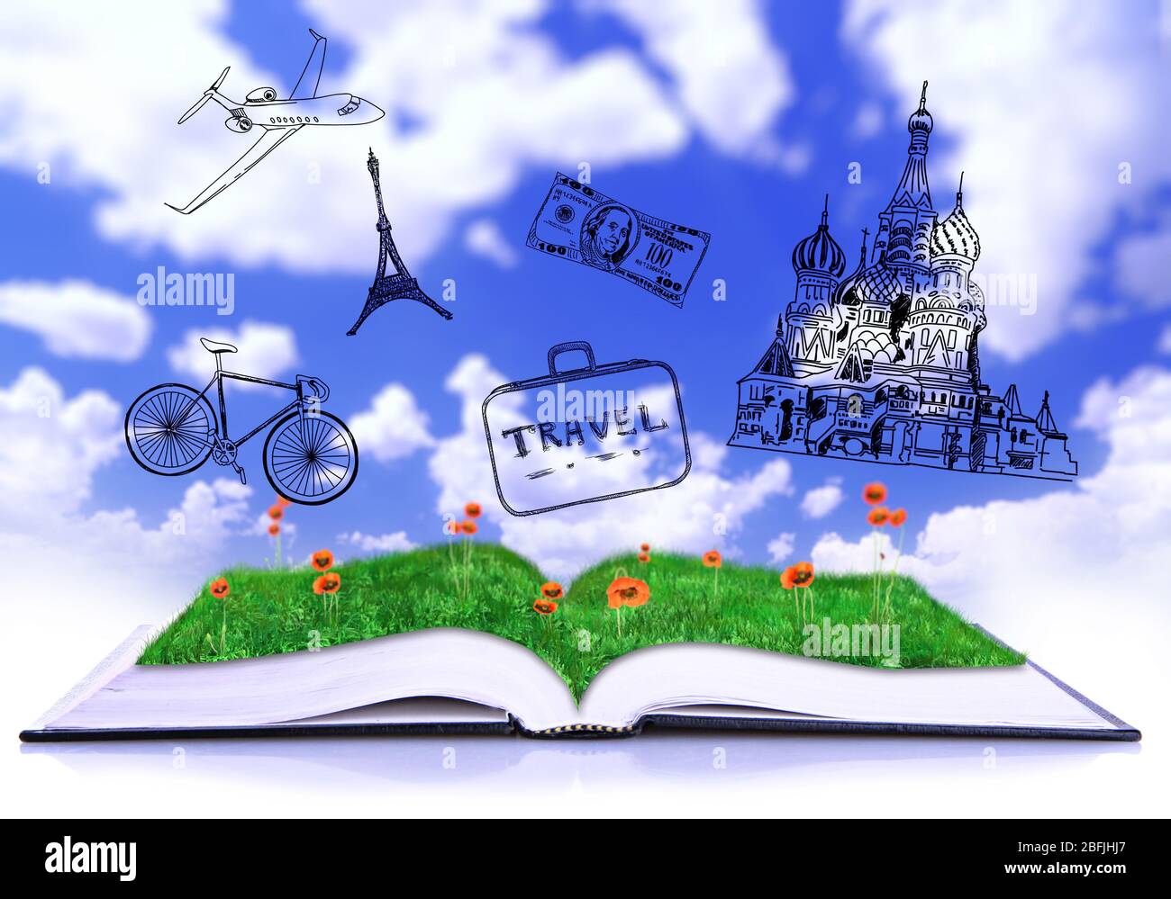 Apri il libro con disegni su sfondo cielo Foto Stock