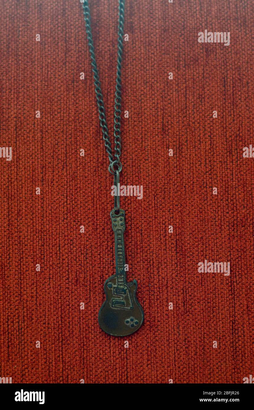 Collana per chitarra Old Rusty, collana per chitarra Vintage Rusty, accessorio Foto Stock