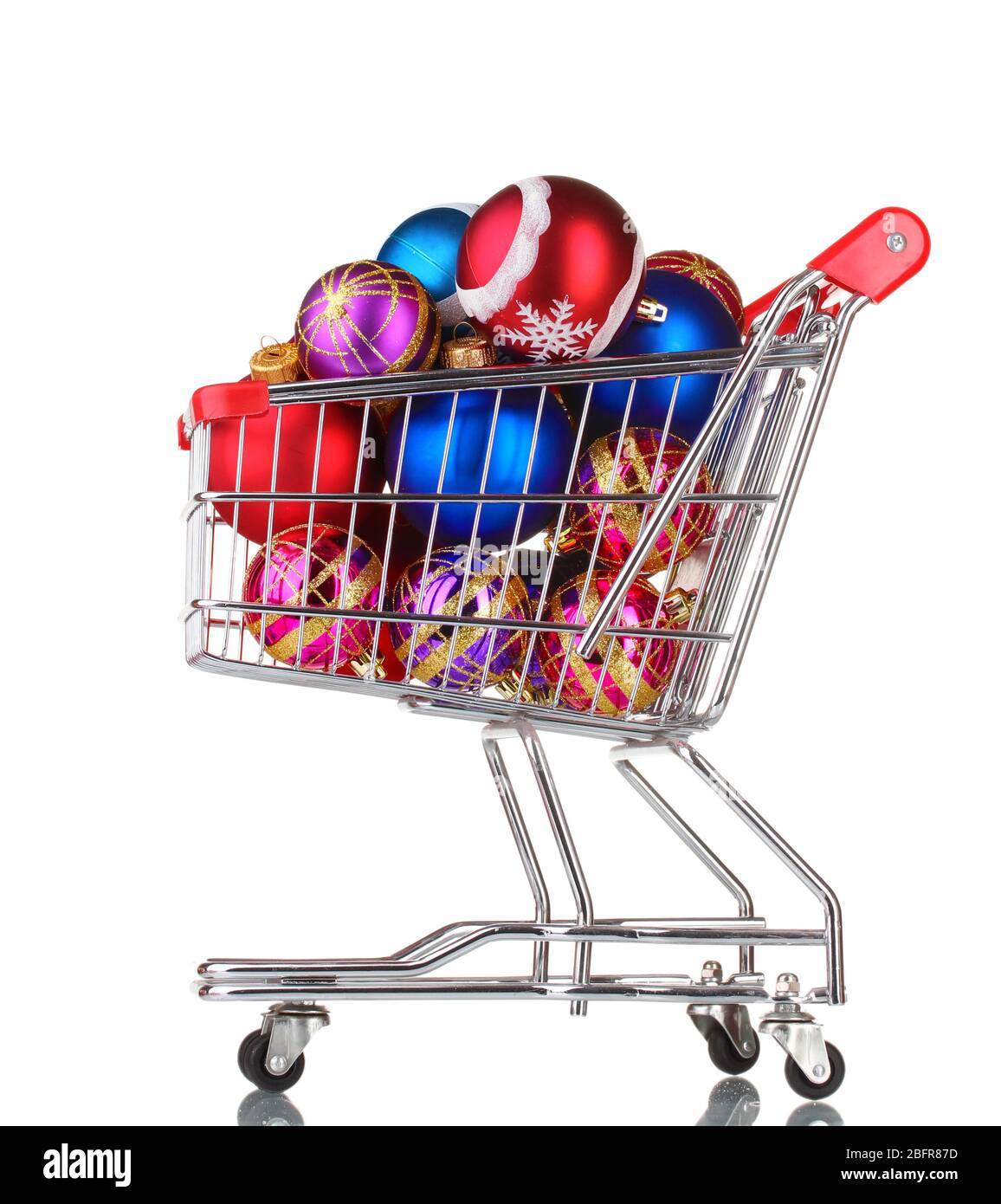 Bella Bright Bright Bal Natale nel carrello isolato su bianco Foto Stock