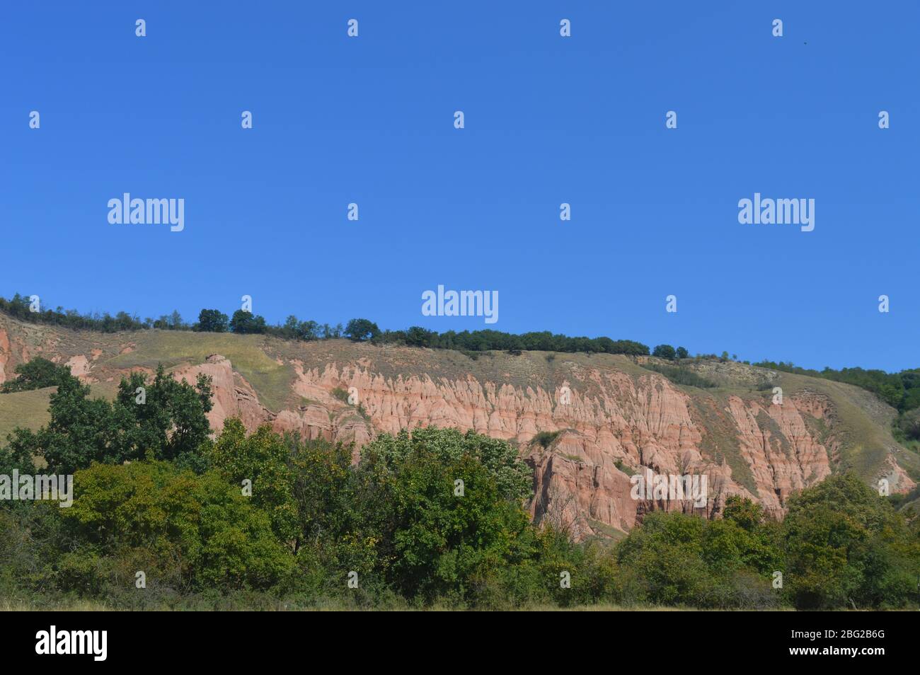 Il rosso burrone Alba Foto Stock