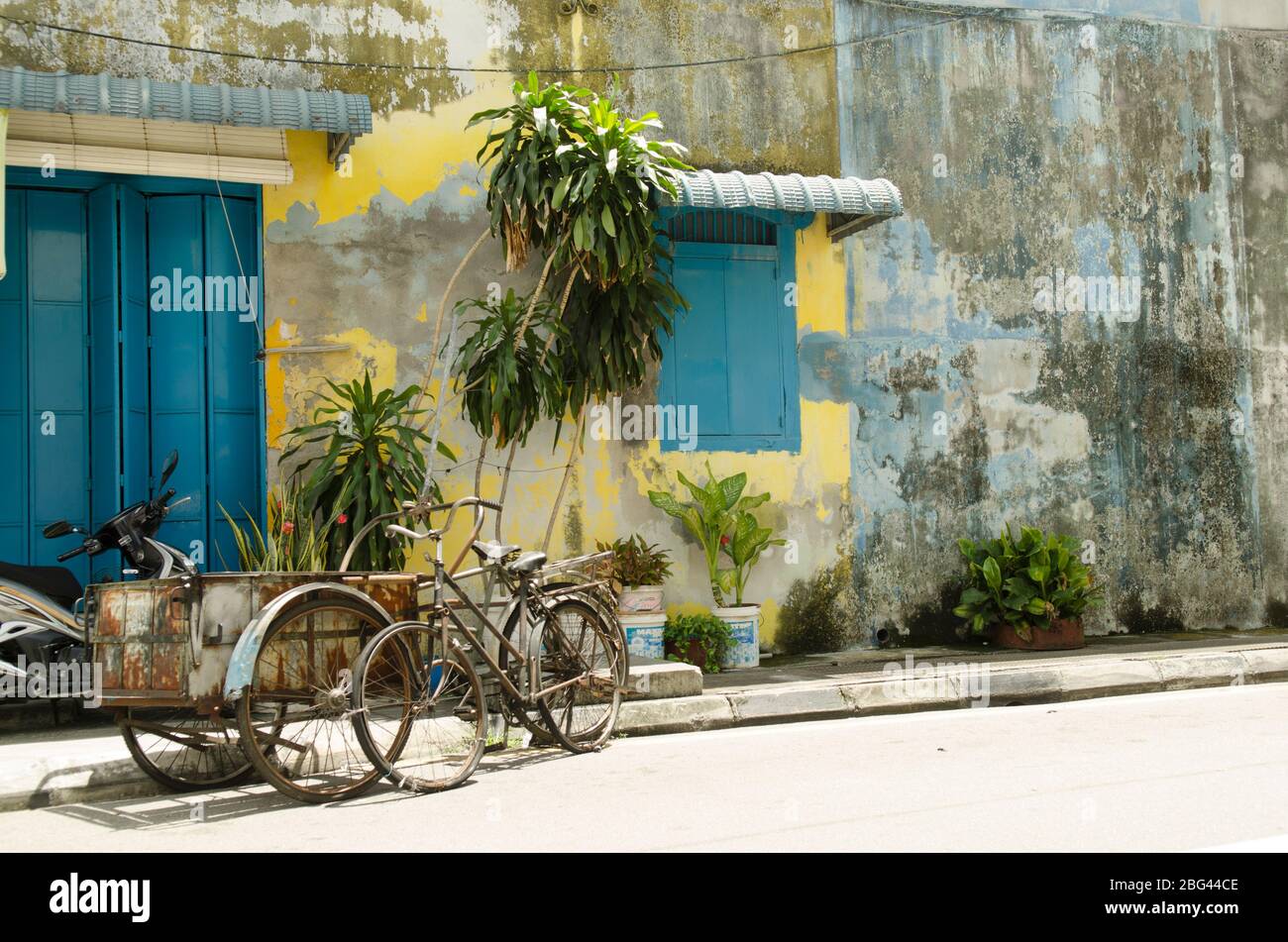 Risciò per le strade di George Town, Penang, Malesia Foto Stock