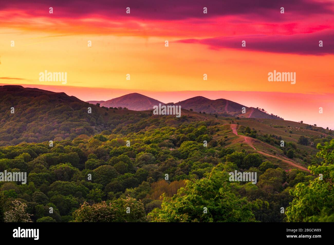 Tramonto sulle Malvern Hills verso Worcestershire Beacon West midlands Inghilterra Foto Stock