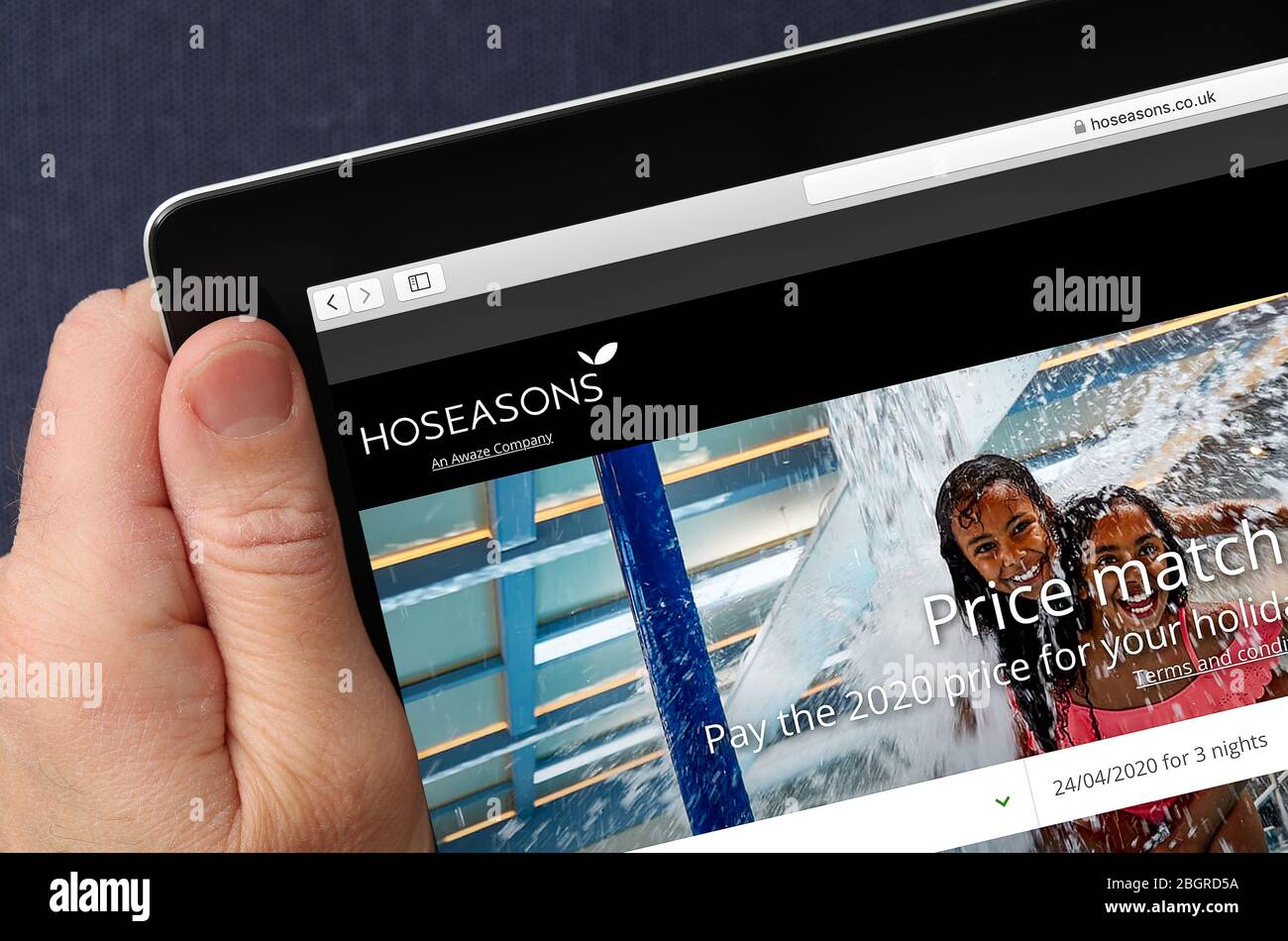 Sito web delle vacanze di HoSeasons visualizzato su un iPad Foto Stock