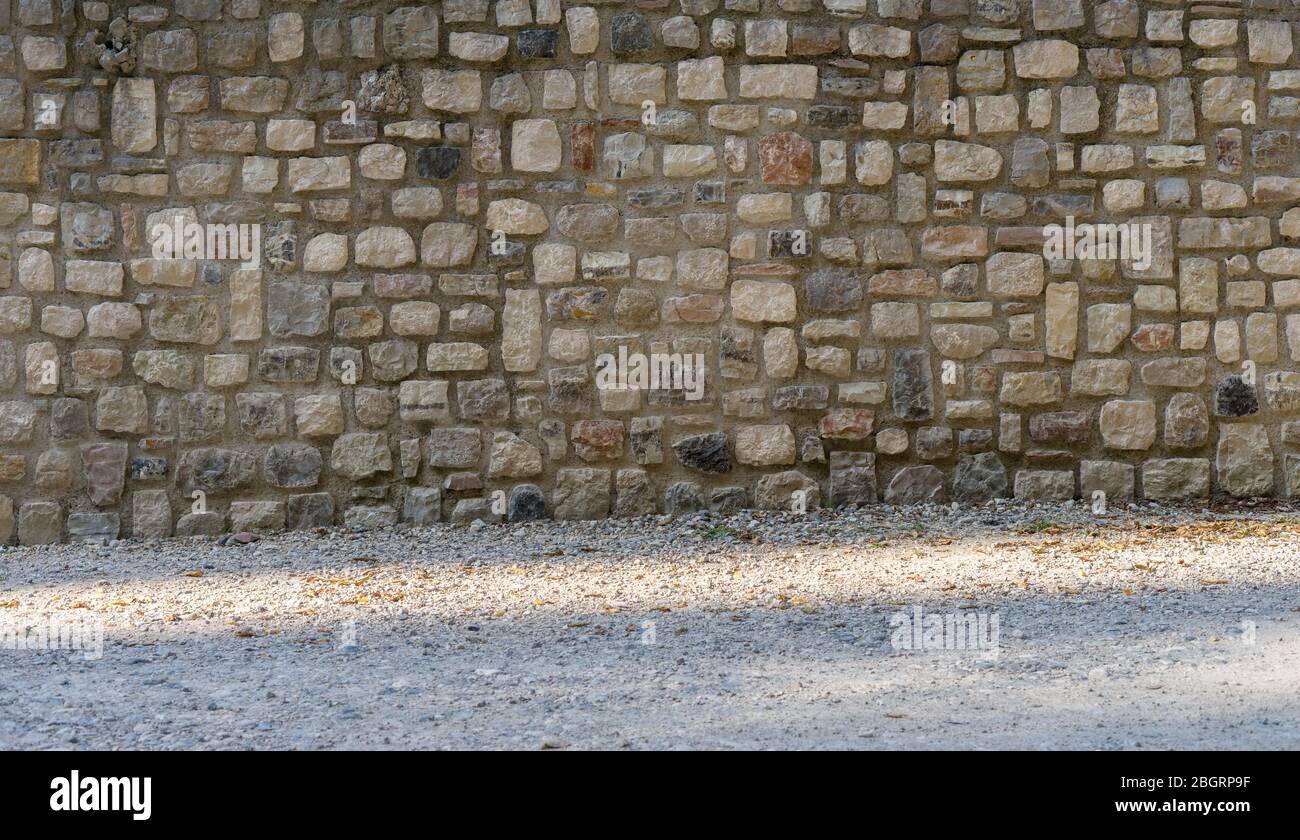 Tradizionale parete mediterranea in pietra naturale Foto Stock
