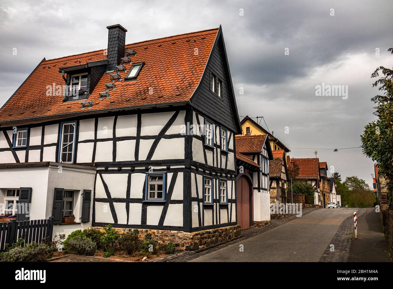 Case rurali storiche a graticcio nel villaggio di Trais, quartiere della città di Münzenberg, Wetteraukreis distretto, Hesse, Germania, Europa Foto Stock