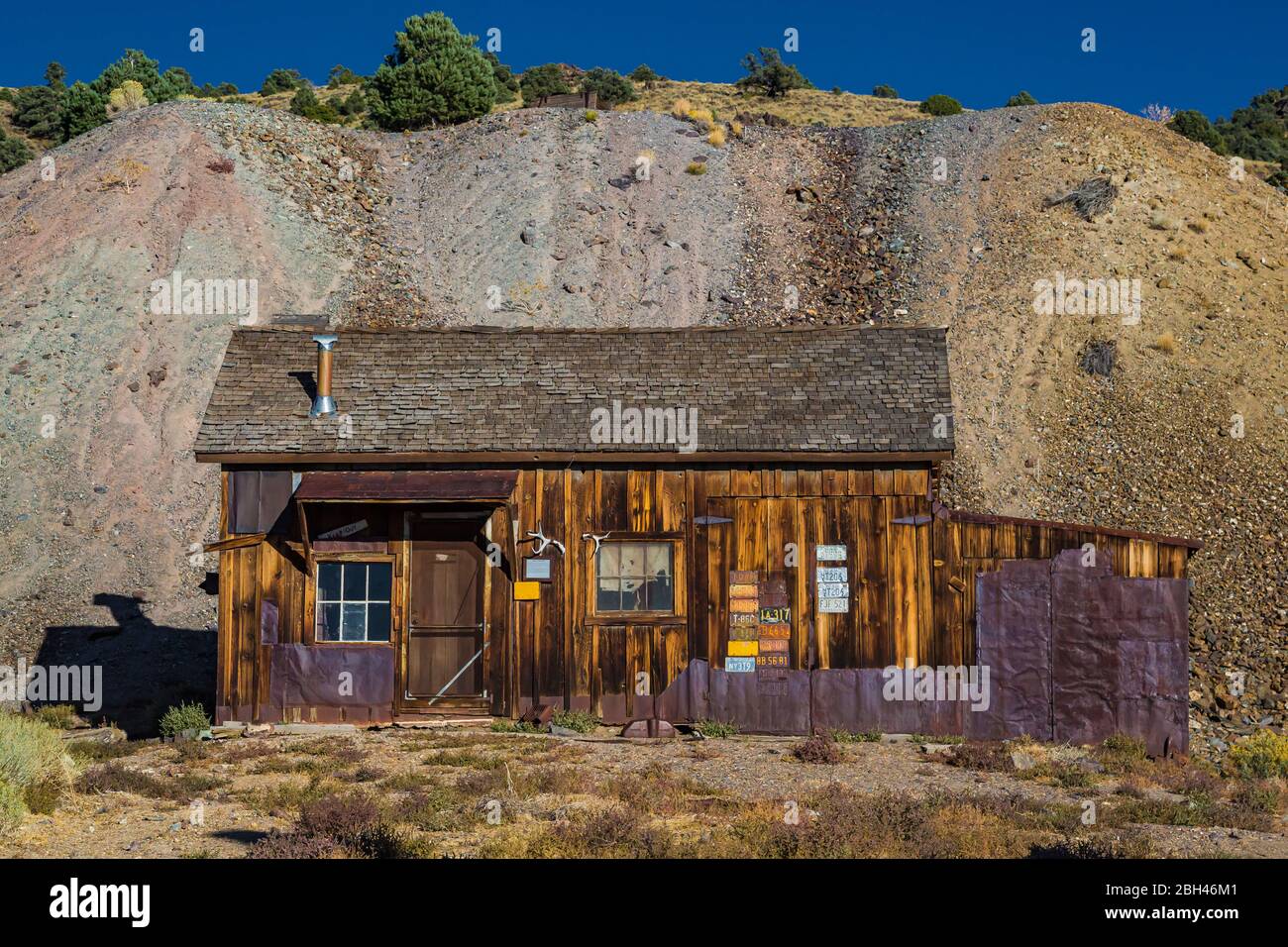 Sosta a Stagecoach nella vecchia città fantasma di Berlino, dove si trovano le miniere d'argento e d'oro, nel Berlin-Ichthyosaur state Park, Nevada, USA Foto Stock