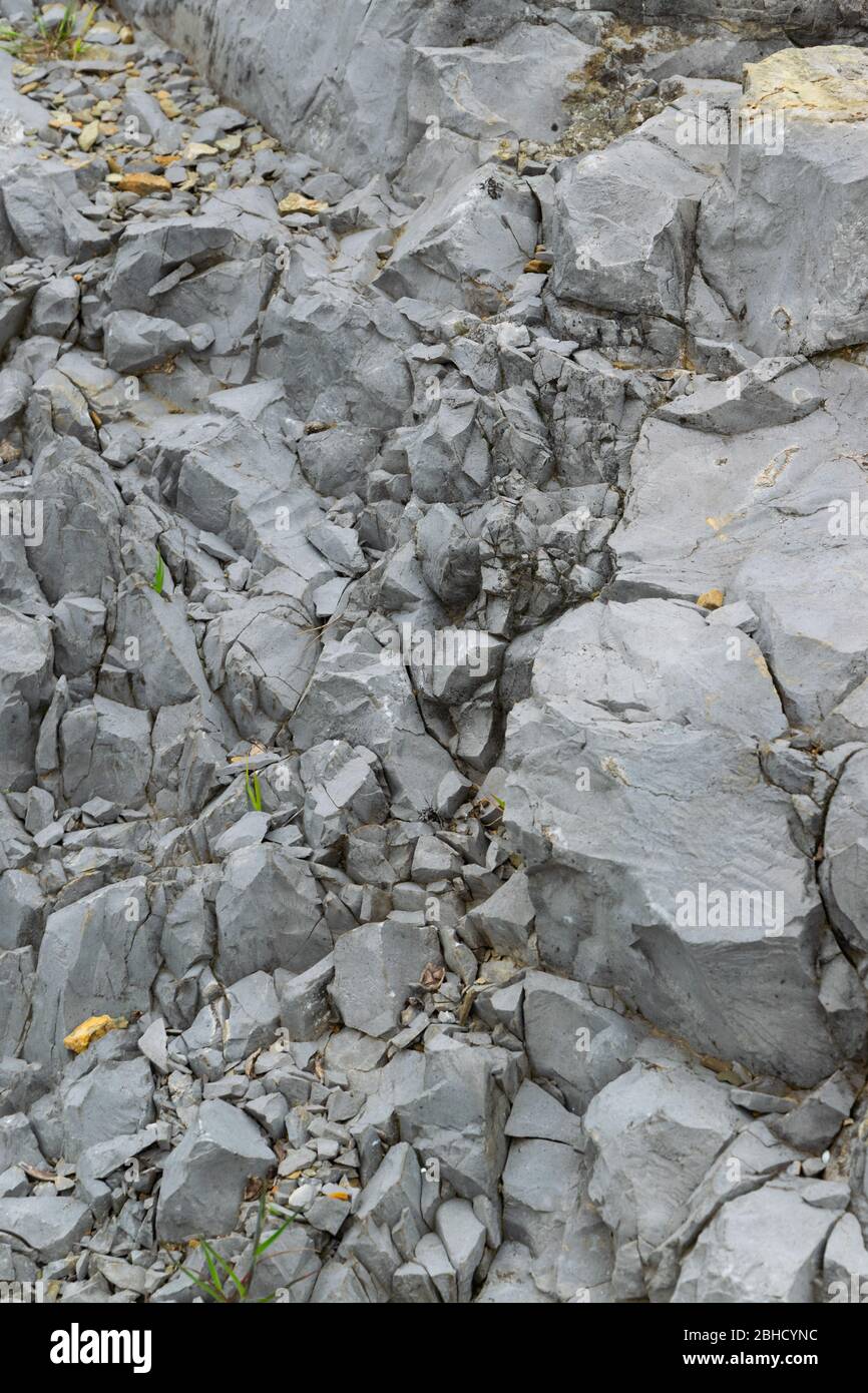 Dettaglio del naturale di pietra grezza, increspato sfondo rock Foto Stock