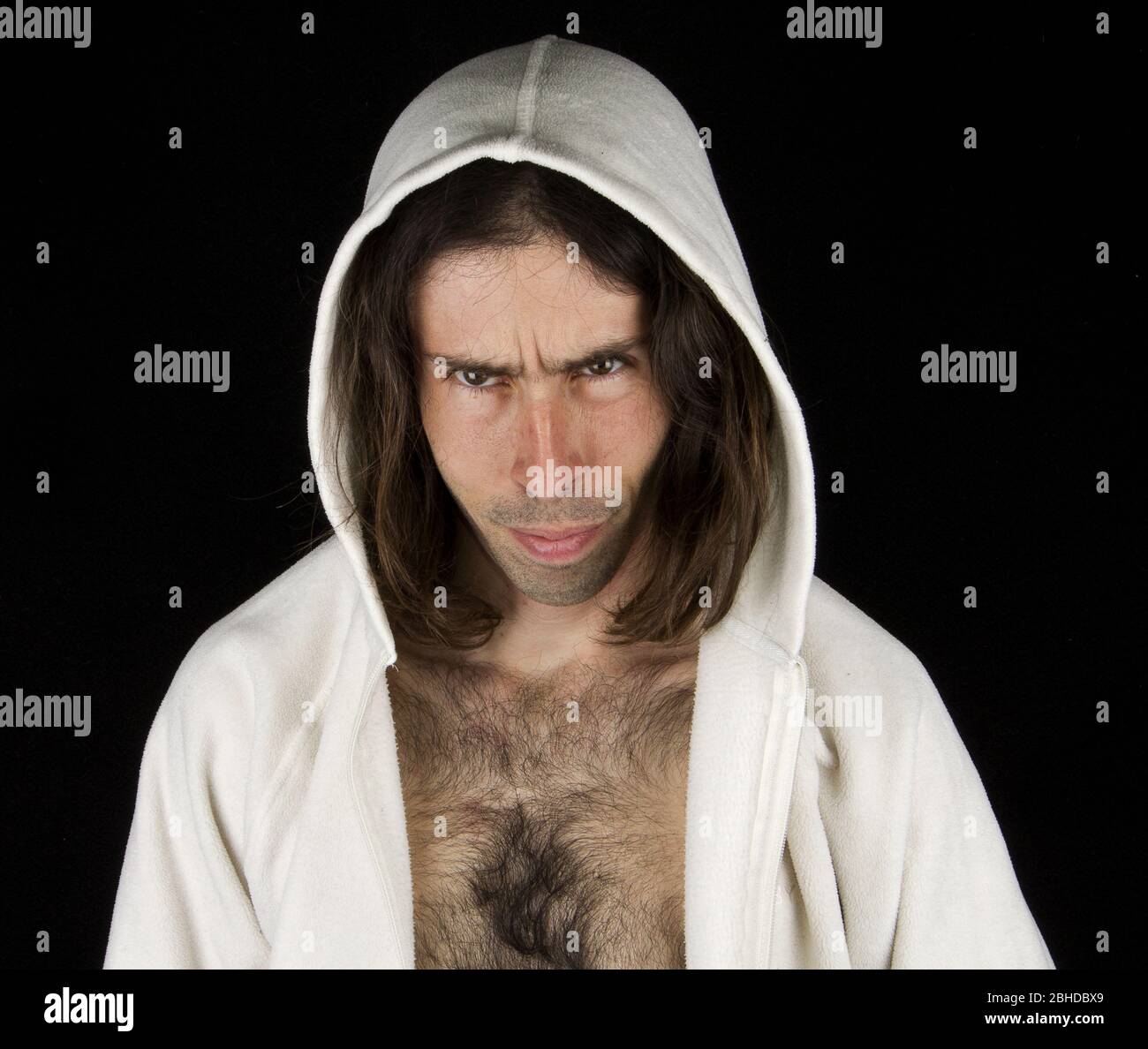 uomo e cappa Foto Stock