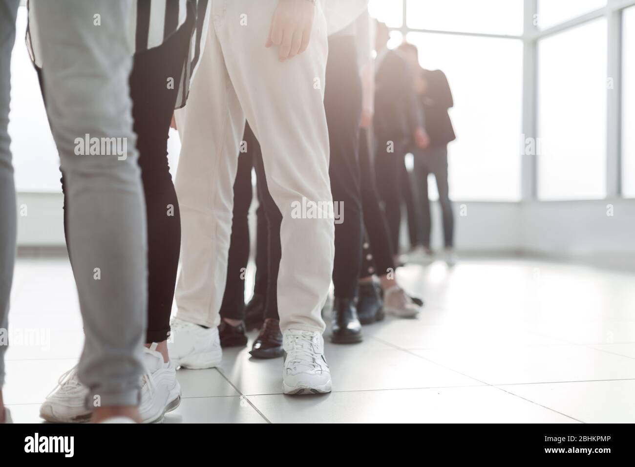 primo piano: gruppo di giovani professionisti in fila Foto Stock