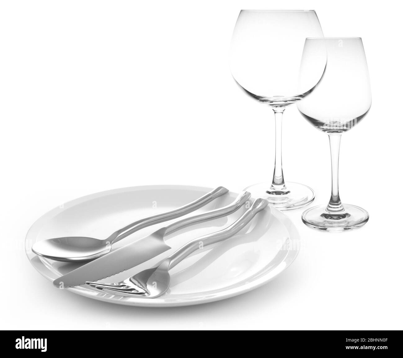 forchetta e coltello e bicchieri da vino isolati Foto Stock