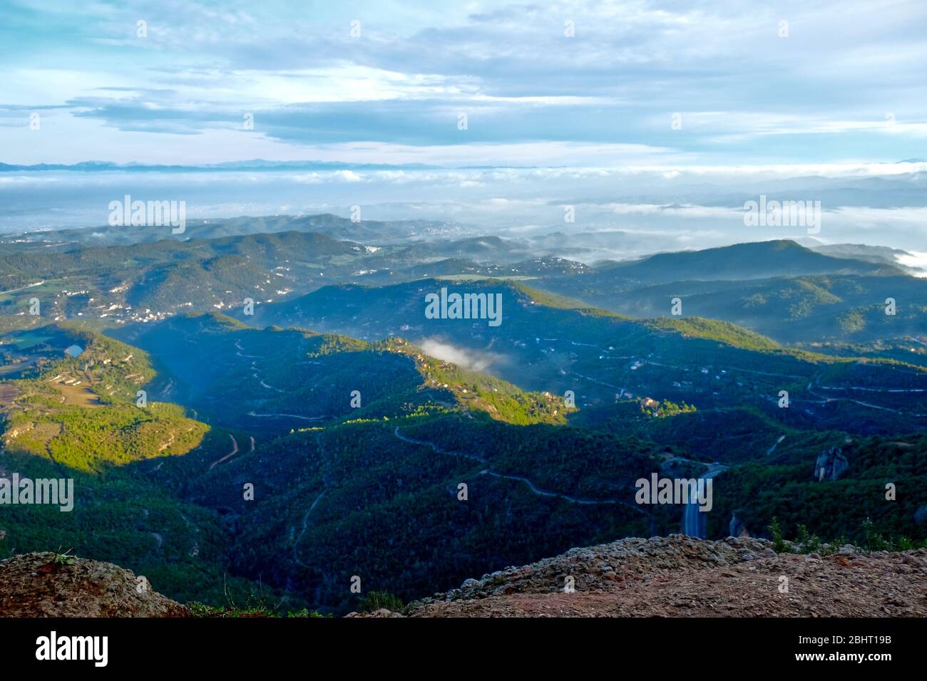 Spanische Berge a den Wolken Foto Stock