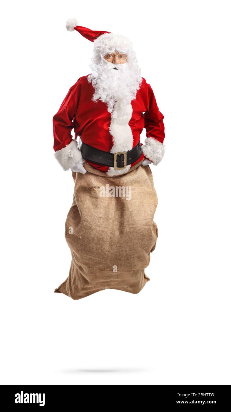 Babbo Natale che salta all'interno di un sacco isolato su bianco backgorund Foto Stock
