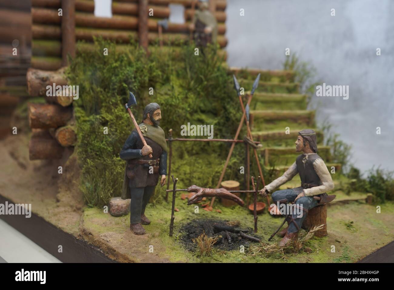 Miniatura di persone che vivono in tempi antichi Foto Stock