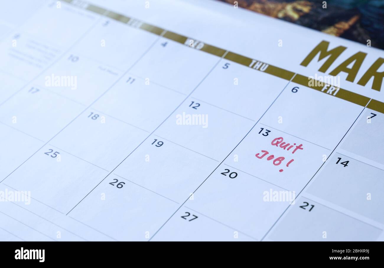 Chiudere le parole del lavoro scritte sul calendario della tabella con un indicatore rosso. Concetto di occupazione o di carriera. Foto Stock