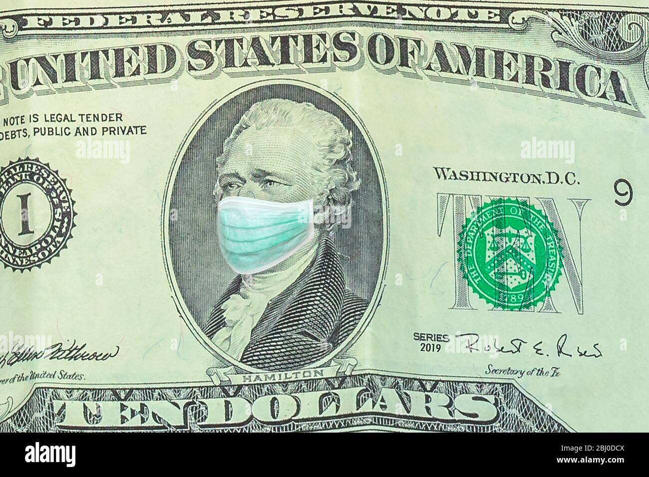 Alexander Hamilton con maschera chirurgica su disegno di legge da dieci dollari USA, serie 2019. Concetto di business della pandemia del virus Covid 19 negli Stati Uniti Foto Stock