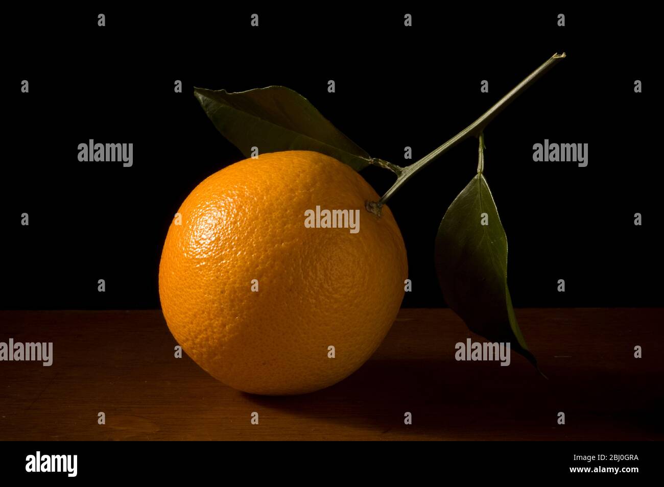 Arancione con foglie - Foto Stock