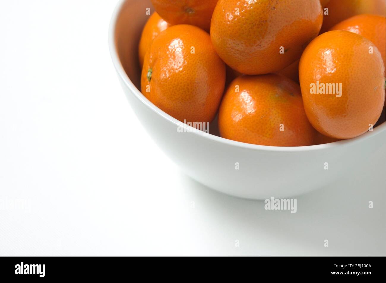 Satsuma su sfondo bianco - Foto Stock