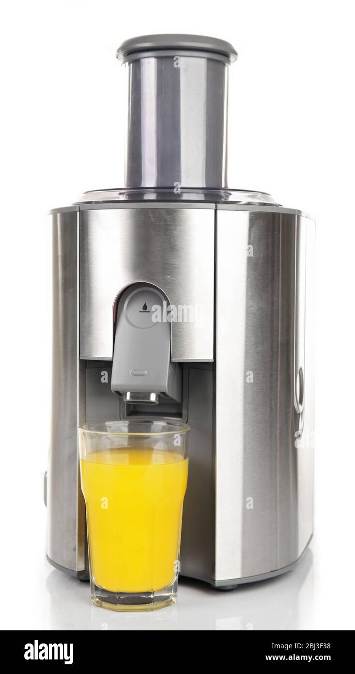 Estrattore di succo in acciaio inox con bicchiere di succo d'arancia  isolato su fondo bianco Foto stock - Alamy