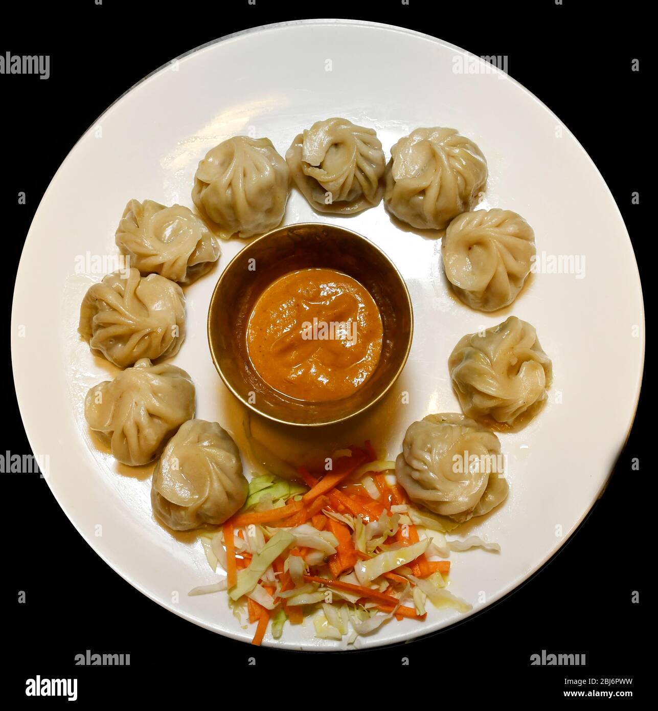 Momo è uno dei prodotti alimentari più venduti in Nepal e India. In Giappone è conosciuto come gnocchi. Foto Stock
