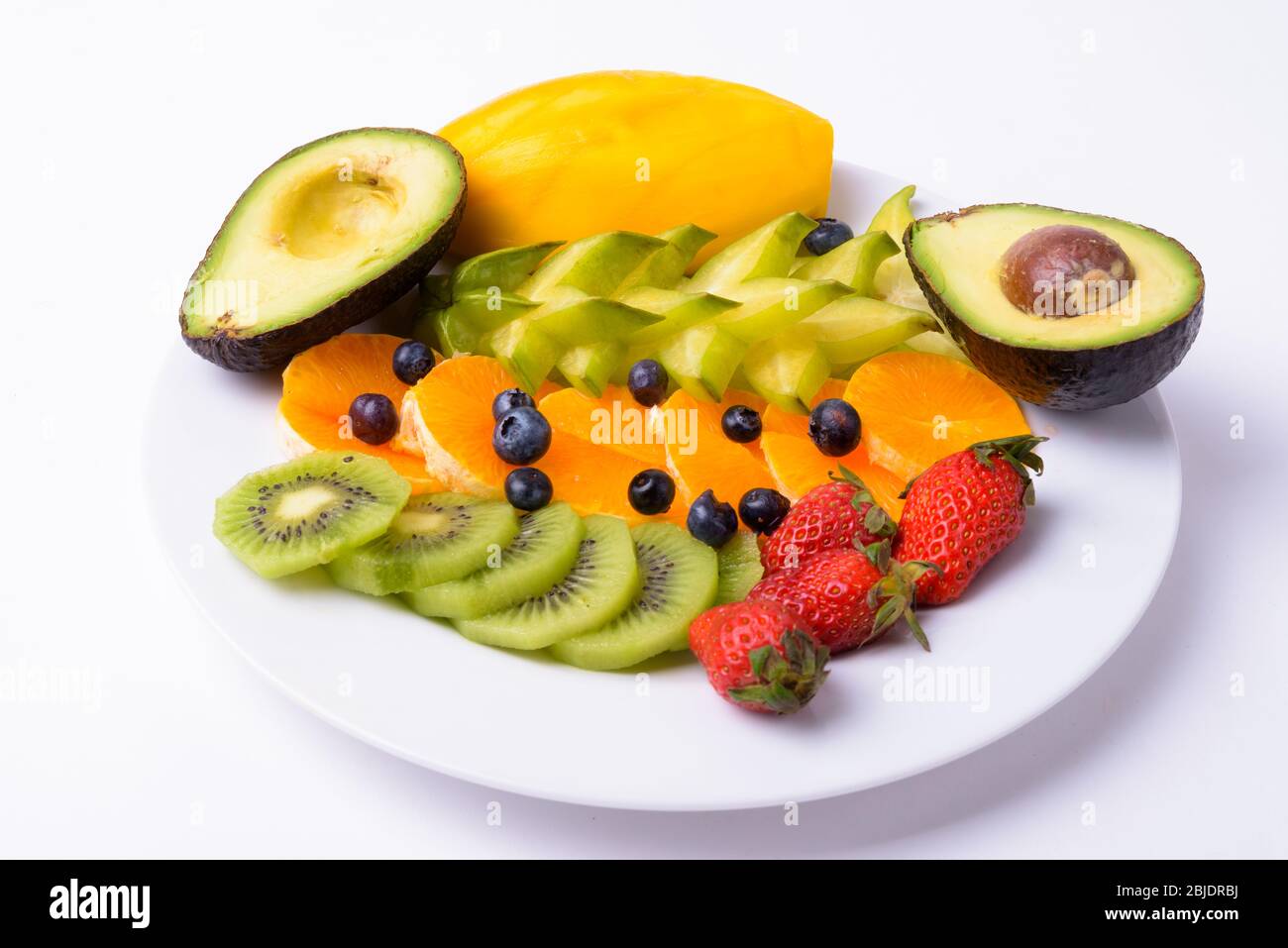 Ritratto di frutta deliziosa assortita su sfondo bianco Foto Stock