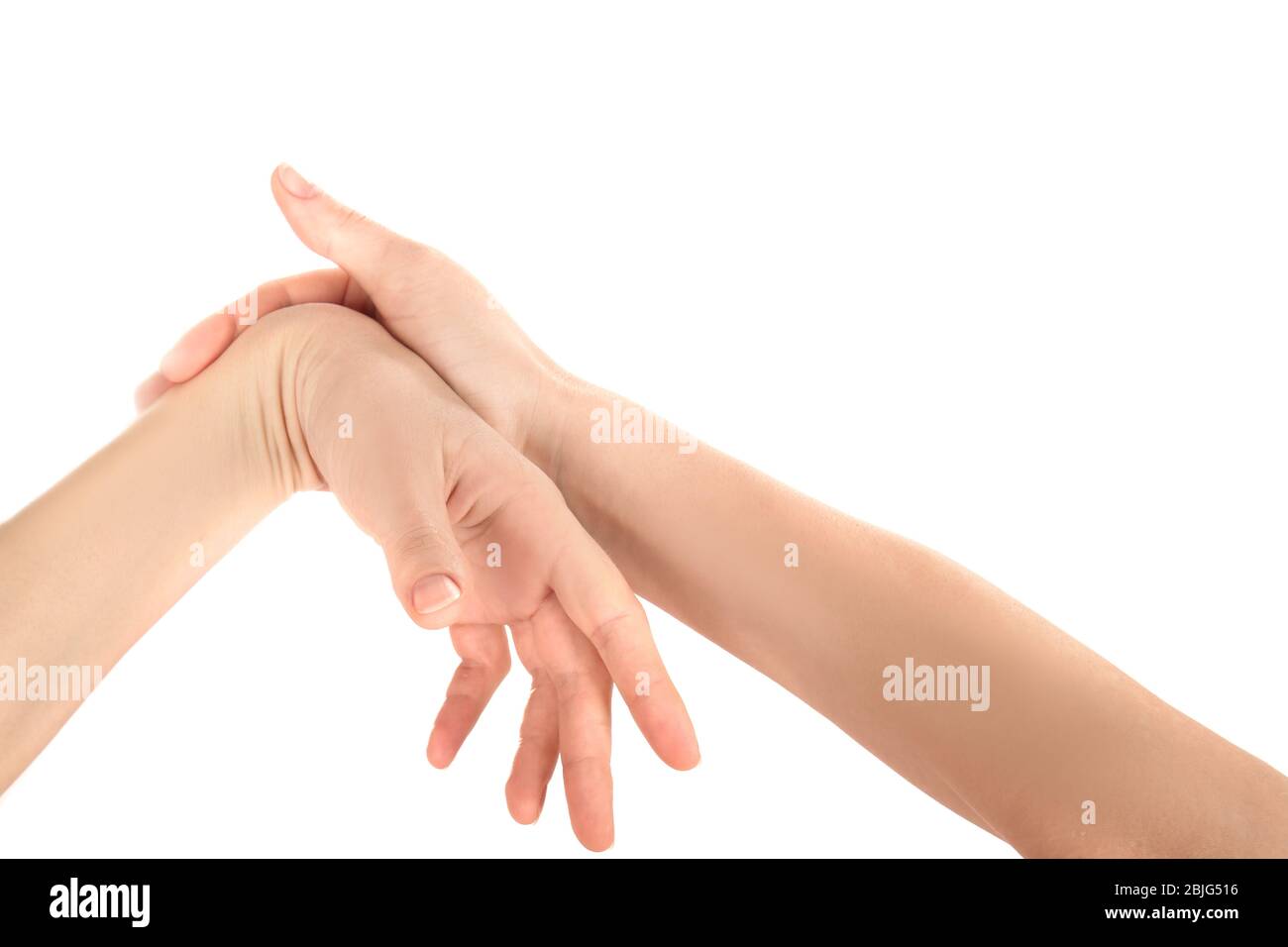 Mani di giovane donna che soffrono di dolore ai polsi su sfondo bianco Foto Stock
