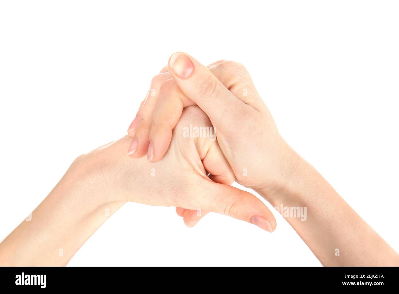 Mani di giovane donna che soffrono di dolore alle articolazioni su sfondo bianco Foto Stock