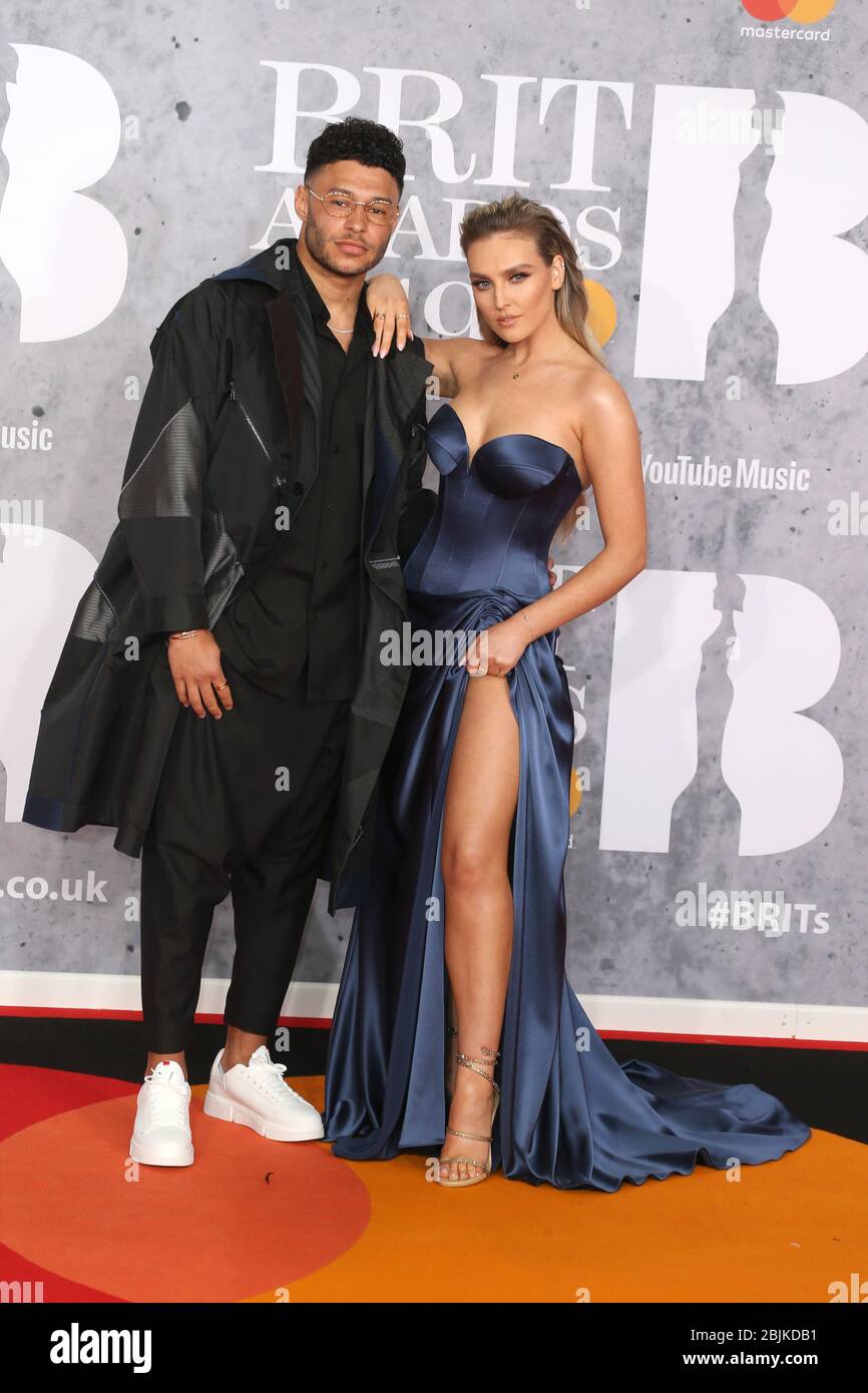 Alex Oxlade-Chamberlain e Perrie Edwards partecipano ai BRIT Awards 2019 presso la O2 Arena il 20 febbraio 2019 a Londra, Regno Unito. Foto Stock