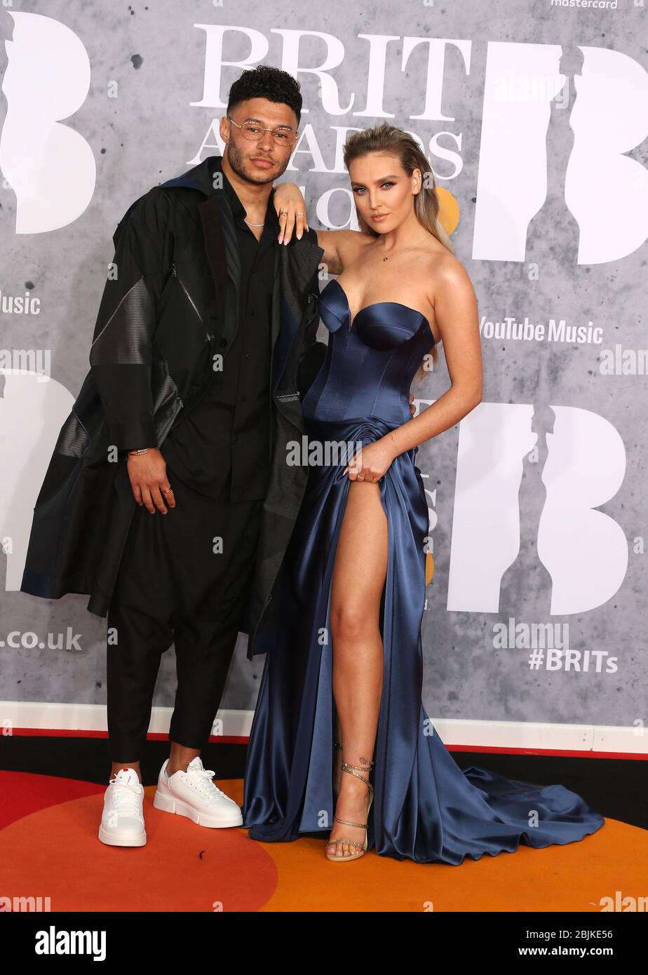 Alex Oxlade-Chamberlain e Perrie Edwards partecipano ai BRIT Awards 2019 presso la O2 Arena il 20 febbraio 2019 a Londra, Regno Unito. Foto Stock