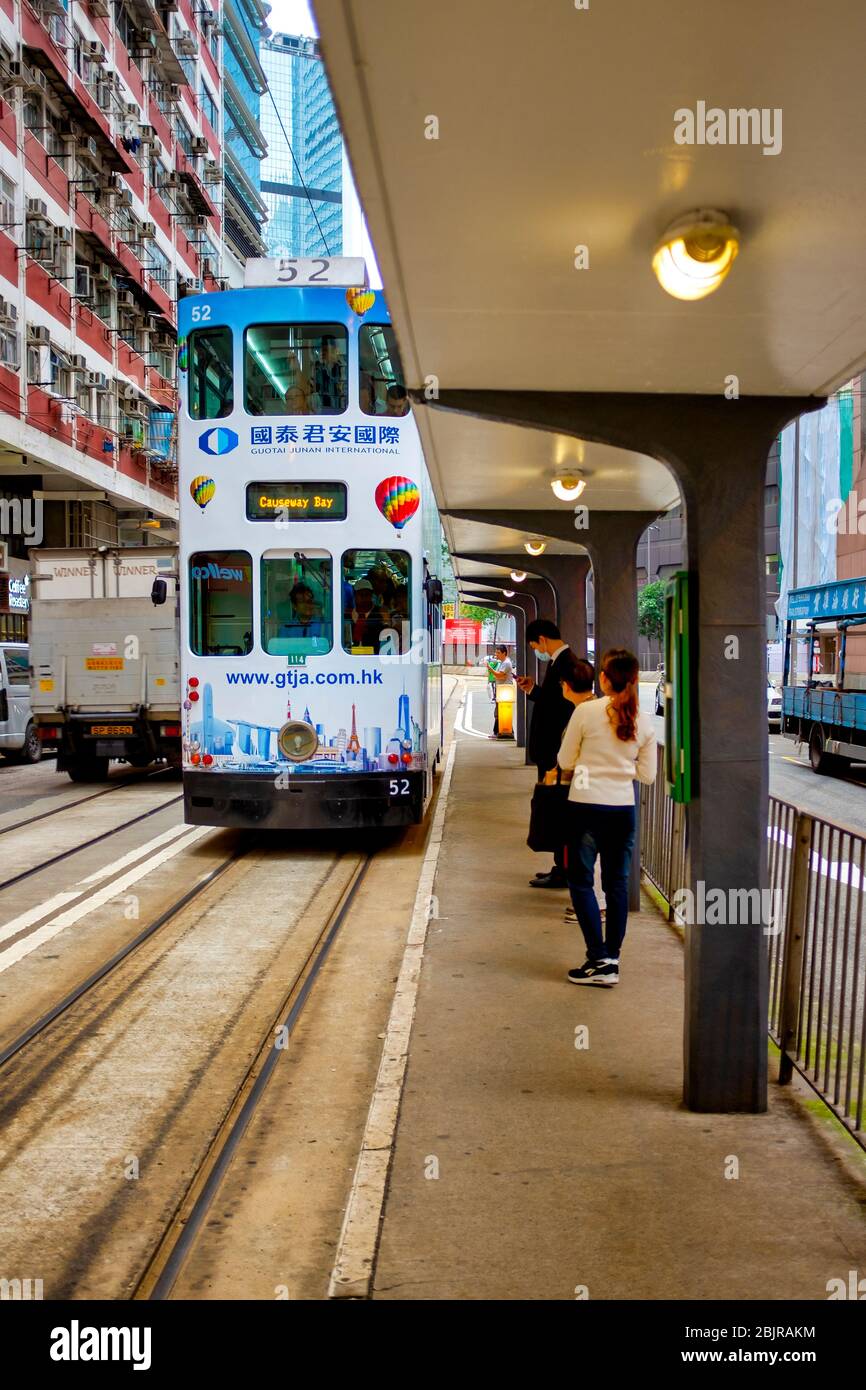Una fermata dell'autobus in Hennessy Road, Hong Kong Island, Cina Foto Stock