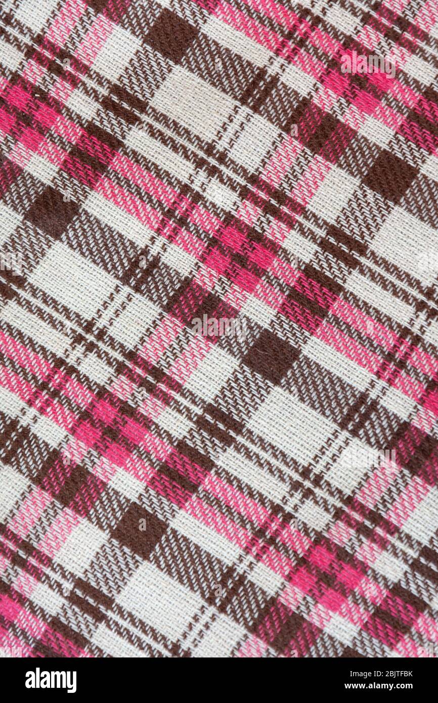 realistico plaid di lana rosa a scacchi marrone, sfondo Foto Stock