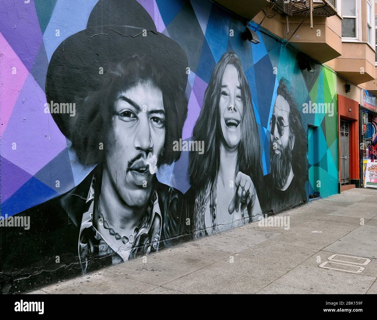 Murale con i musicisti scomparsi Jimi Hendrix, Janis Joplin e Jerry Garcia nel distretto di Haight-Ashbury di San Francisco, California, USA Foto Stock