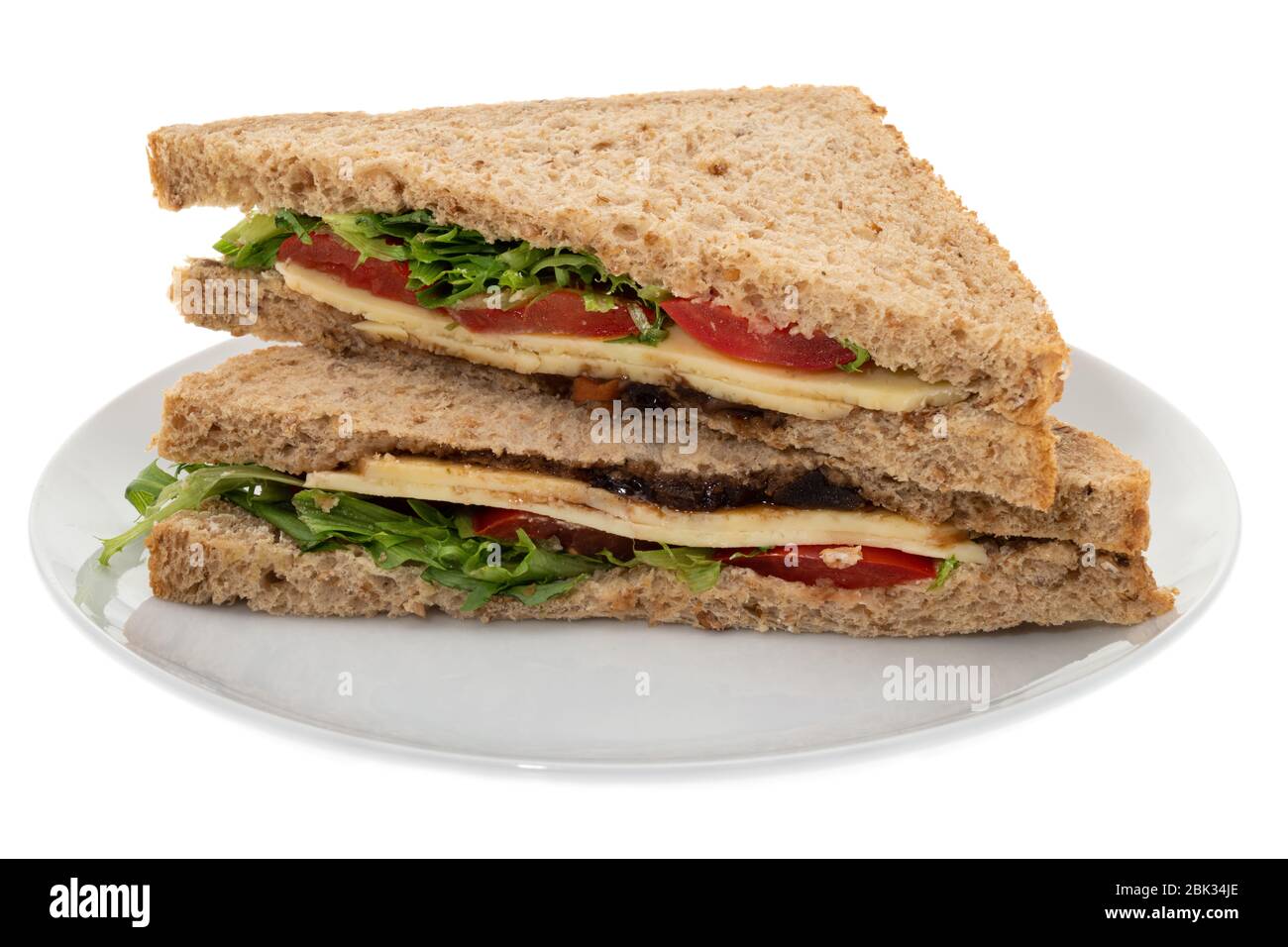 Sandwich con formaggio, pomodoro e lattuga con sottaceti - fondo bianco Foto Stock