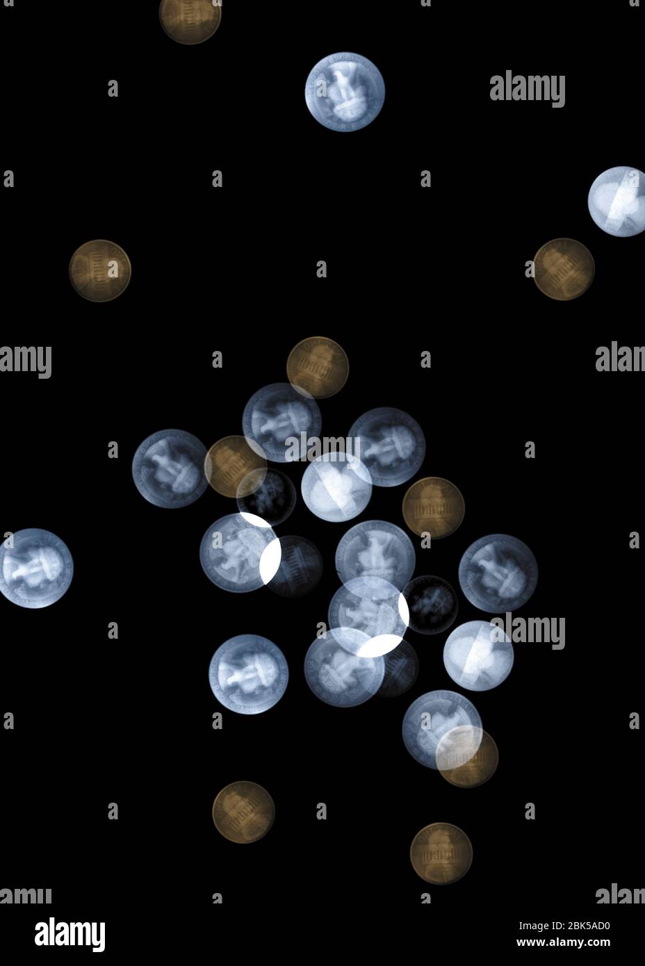 Monete, raggi X colorati. Foto Stock