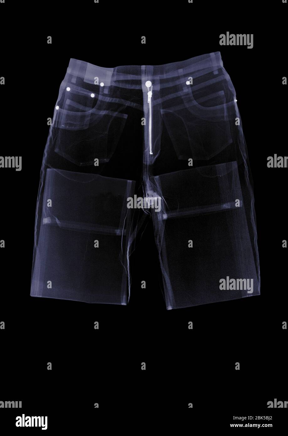 Paio di jeans piegati, raggi X. Foto Stock