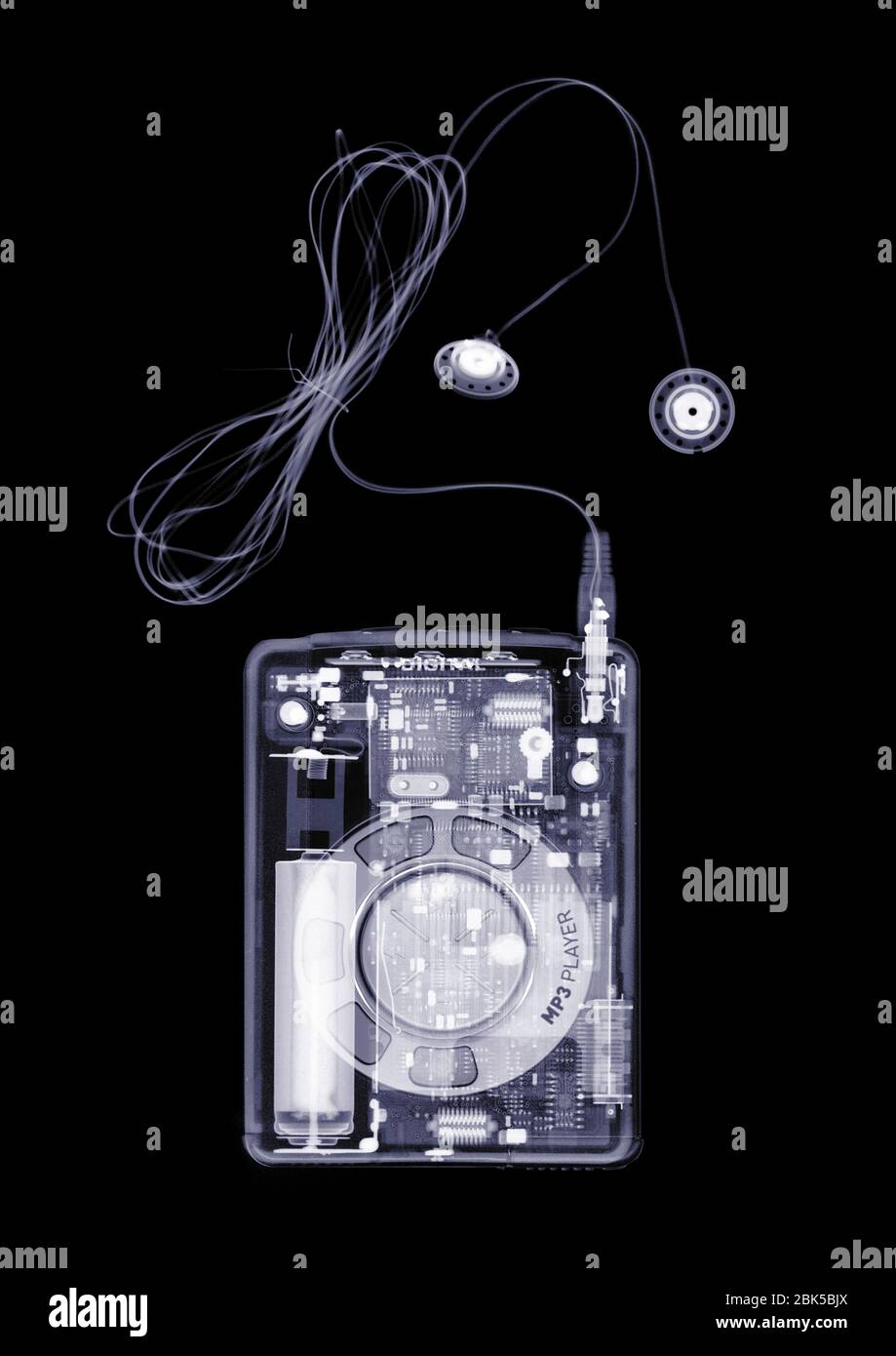 Lettore MP3 e auricolari, raggi X. Foto Stock